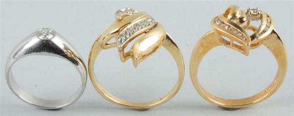 LOT OF 3: RINGS WITH DIAMONDS.                    