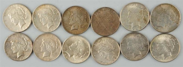 LOT OF 12: PEACE SILVER DOLLARS.                  