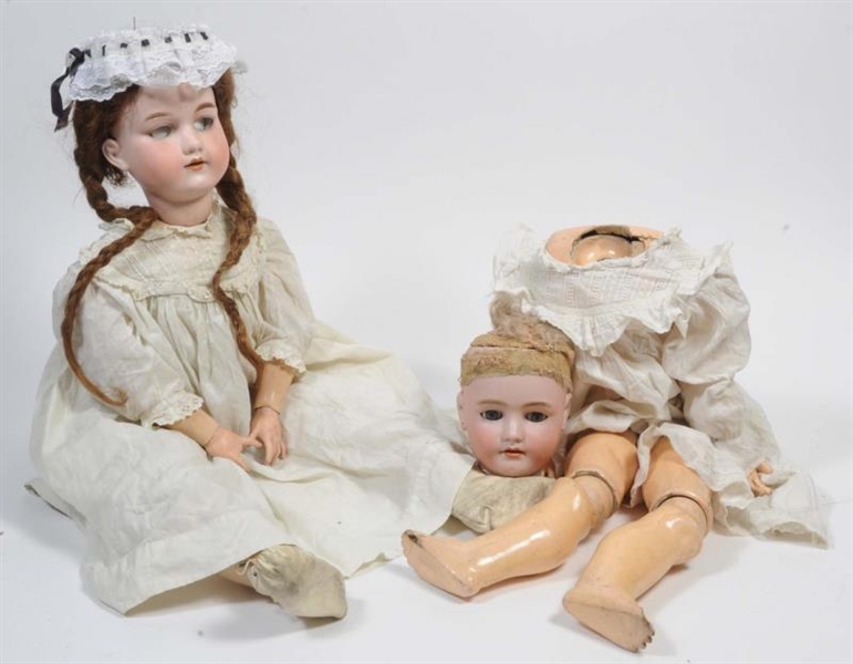 2 LARGE BISQUE HEAD ON COMPOSITION BODY DOLLS.    
