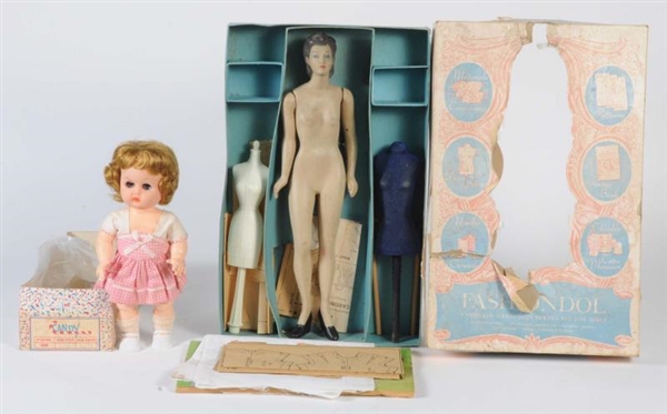 LOT OF 2: BOXED DOLLS.                            
