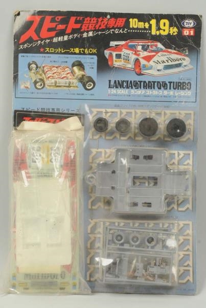BATTERY-OPERATED SLOT CAR.                        