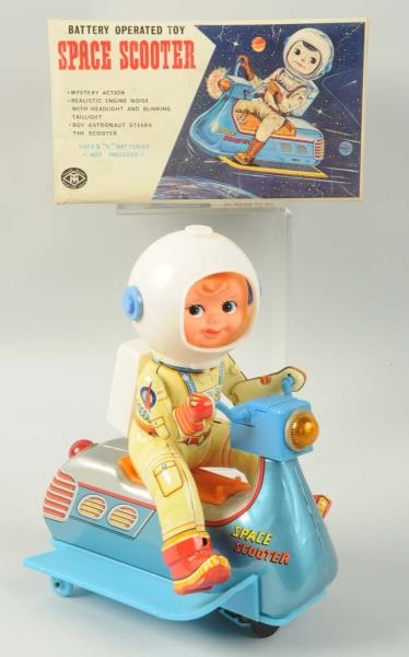 TIN LITHO & PLASTIC SPACE SCOOTER TOY.            
