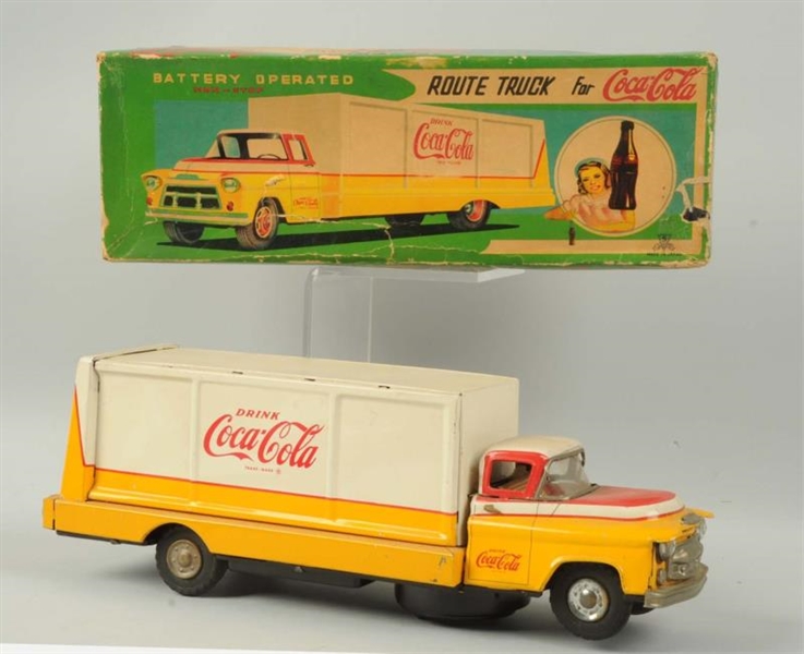 TIN BATTERY-OPERATED COCA-COLA TRUCK.             
