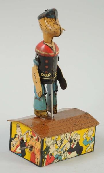 MARX TIN WIND-UP POPEYE DANCER TOY.               