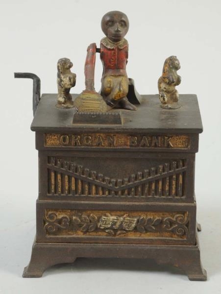 ORGAN MECHANICAL BANK DANCING DOG & CAT.          