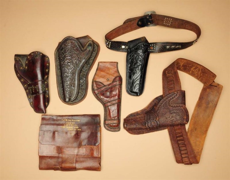 LOT OF LEATHER HOLSTERS.                          