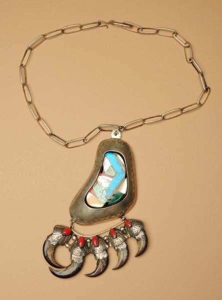 TURQUOISE, SHELL, CORAL, & BEAR CLAW PENDANT.     