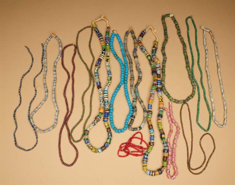 13 STRANDS OLD TRADE BEADS.                       