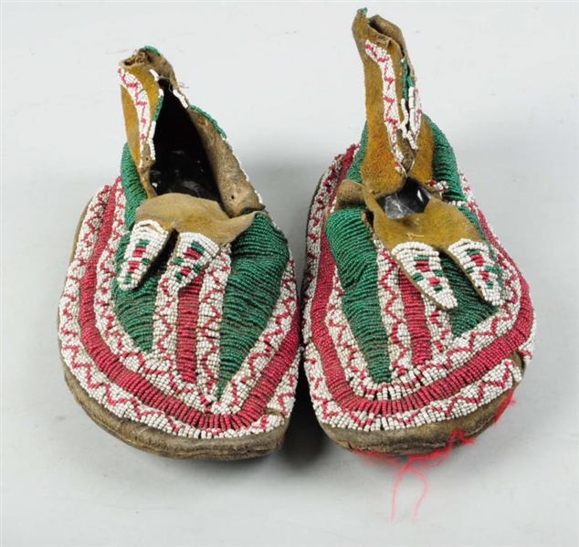 NORTHERN PLAINS 19TH CENTURY BEADED MOCCASINS.    