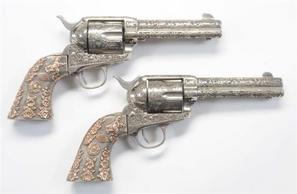 PAIR OF COLT SAA 1ST GENERATION .45 ENGRAVED.**   