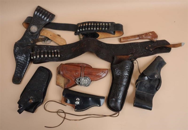 LOT OF 7: HOLSTERS.                               