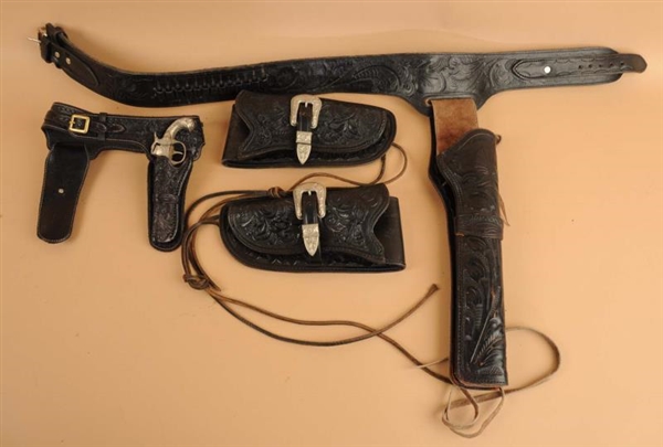 LOT OF 3: PISTOL RIGS AND TWO HOLSTERS.           