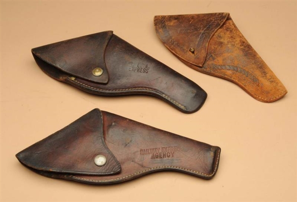 LOT OF 3: RAILWAY EXPRESS AGENCY MARKED HOLSTERS. 