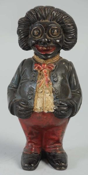 GOLLIWOG CAST IRON STILL BANK.                    