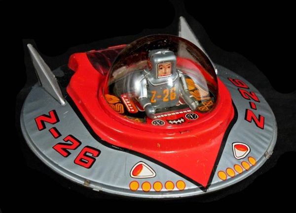 Z-26 FLYING SAUCER WITH TIN ASTRONAUT.            