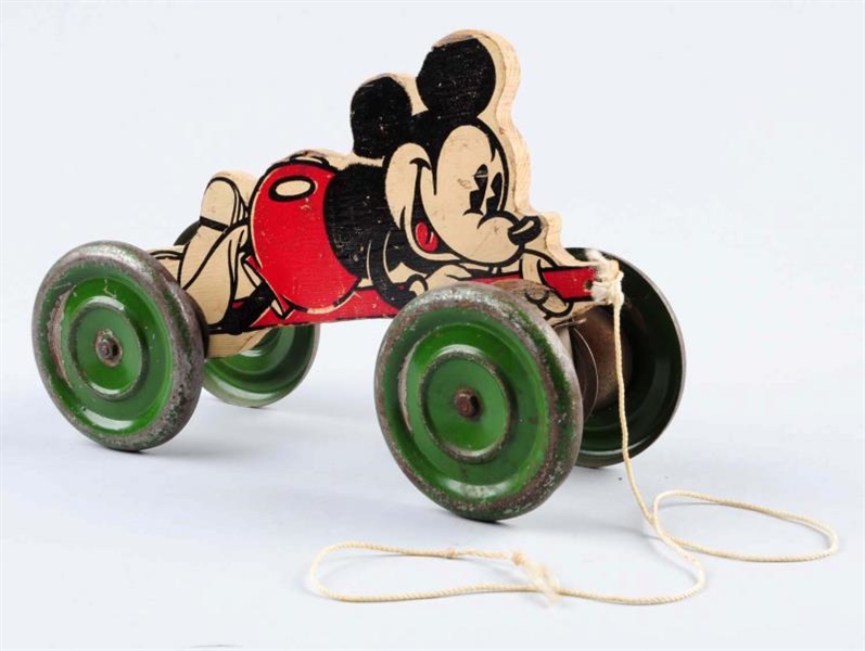 MICKEY MOUSE PULL TOY ON WHEELS.                  
