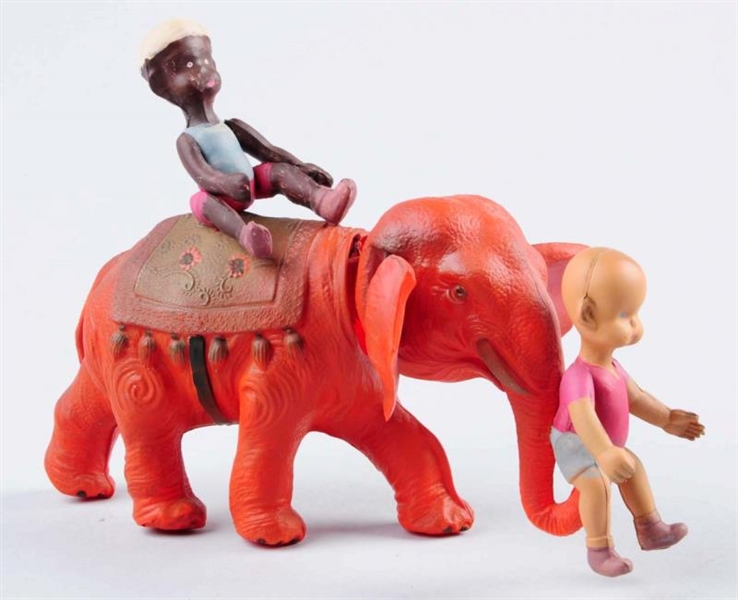 CELLULOID ELEPHANT WITH TWO CHILDREN.             