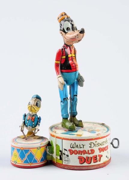 MARX TIN WIND-UP DONALD DUCK DUET TOY.            