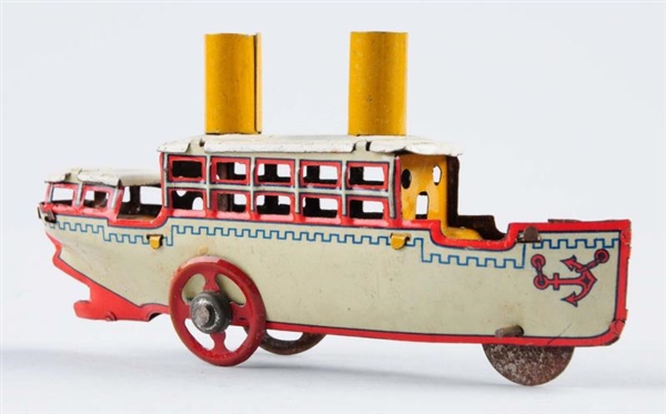 GERMAN TIN STEAMBOAT WITH WHEELS PENNY TOY.       