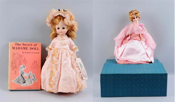 LOT OF 2: VINTAGE DOLLS AND A BOOK.               