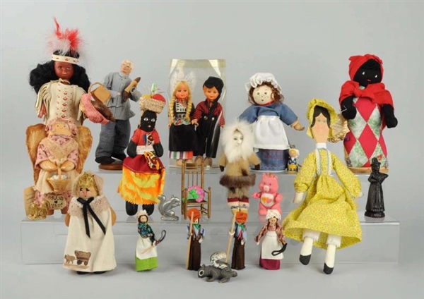 LOT OF 16: ASSORTED DOLLS OF VARIOUS MATERIALS.   