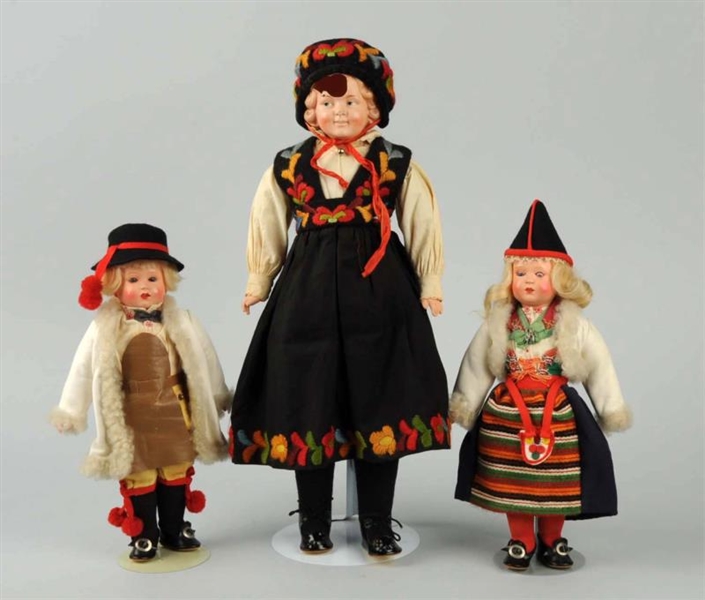 LOT OF 3: ANTIQUE CELLULOID ETHNIC DOLLS.         