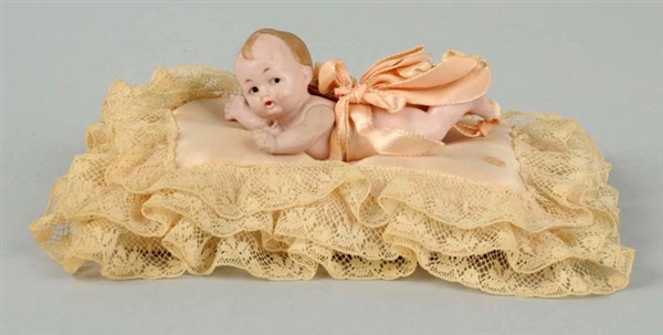 ANTIQUE ALL BISQUE LYING BABY.                    