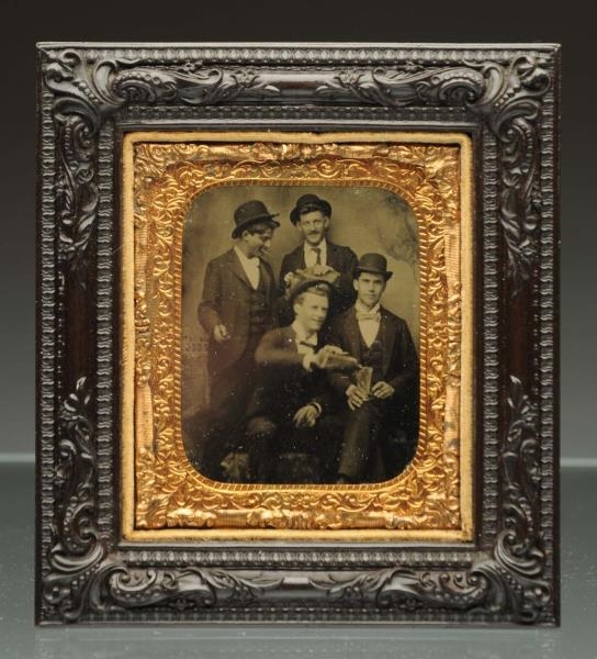 TIN TYPE OF FOUR MEN WITH HATS DRINKING.          