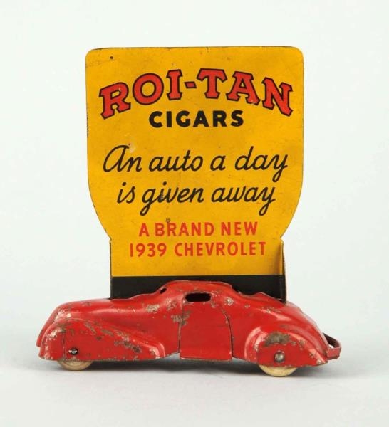 ROI - TAN CIGARS TOY CAR WITH SIGN.               