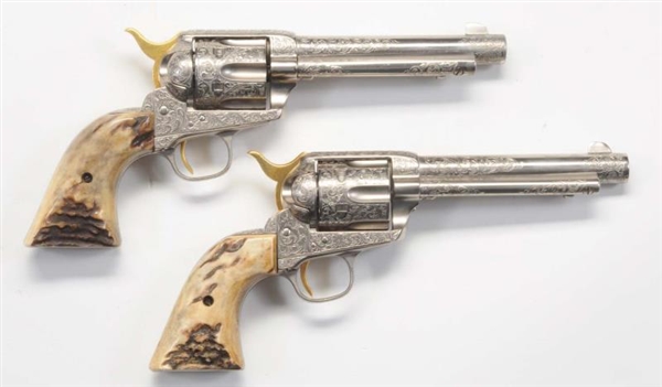 PAIR OF ENGRAVED COLT S.A.A. REVOLVERS.           