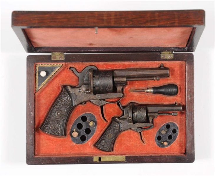 CASED PAIR OF ANTIQUE PIN FIRE REVOLVERS.         