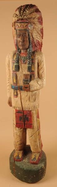 CARVED WOODEN NATIVE AMERICAN FIGURE.             