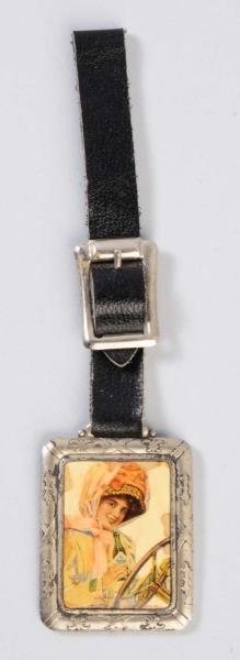 1911 COCA - COLA DUSTER GIRL WATCH FOB.           
