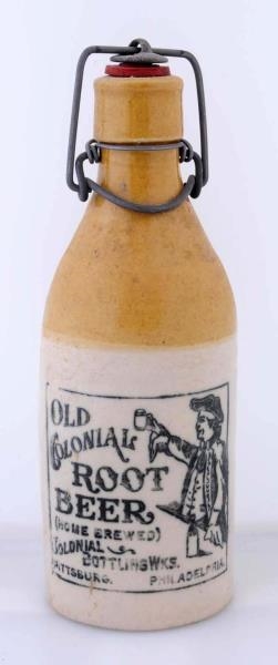 OLD COLONIAL ROOT BEER STONEWARE BOTTLE.          