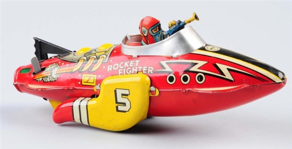 MARX TIN WIND - UP ROCKET FIGHTER SPACE TOY.      