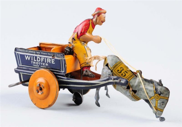 TIN WIND - UP WILDFIRE TROTTER.                   