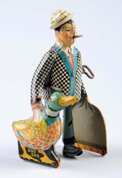 MARX TIN WIND - UP MAN WALKING WITH DUCK.         