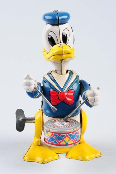 TIN WIND - UP DONALD DUCK THE DRUMMER.            