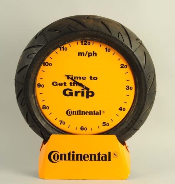 CONTINENTAL MOTORCYCLE TIRE CLOCK DISPLAY.        
