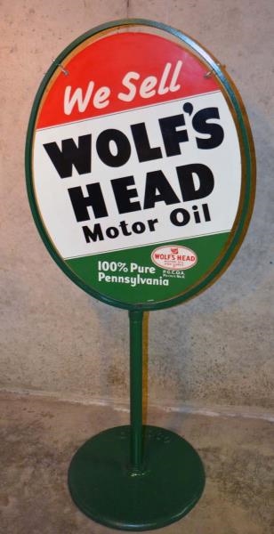 WE SELL WOLFS HEAD MOTOR OIL SIGN.               