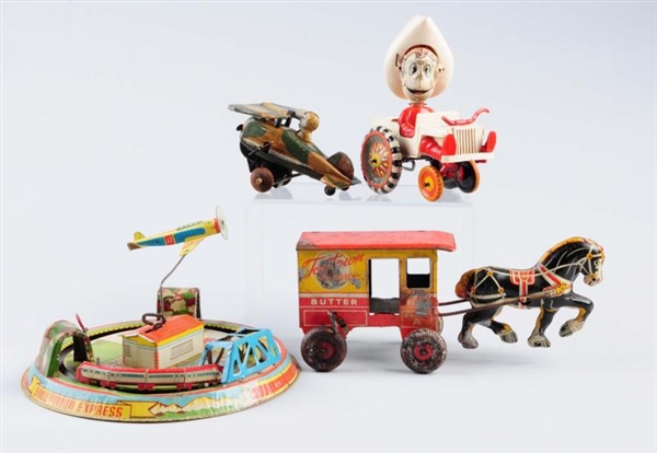 LOT OF 4: TIN WIND - UP TOYS.                     