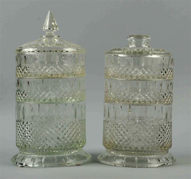 LOT OF 2: CANDY JARS.                             