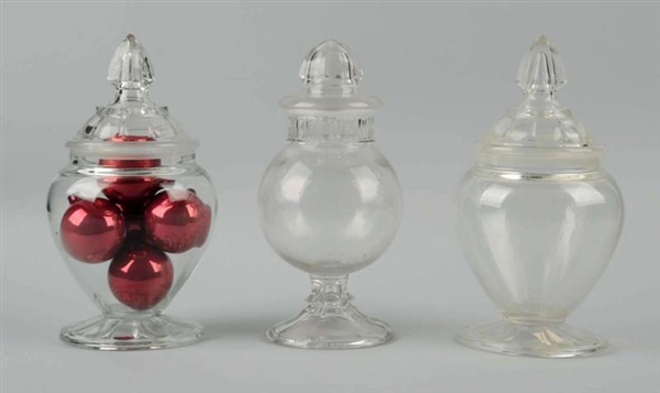 LOT OF 3: GLASS CANDY/APOTHECARY JARS.            