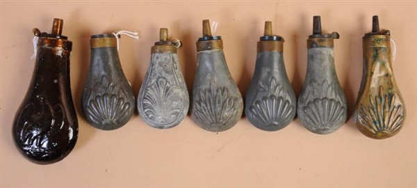 COLLECTION OF 7: SMALL PISTOL/REVOLVER FLASKS.    