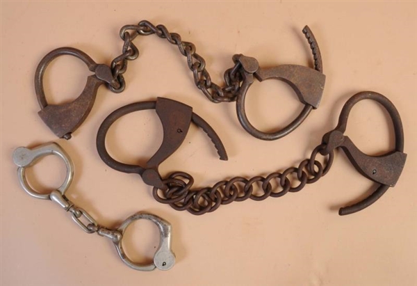 LOT OF 3: ANKLE & HANDCUFFS.                      