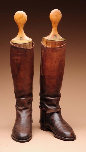 PAIR OF BOOTS WITH EARLY STRETCHERS.              