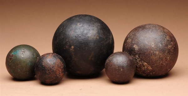 LOT OF 5: ASSORTED CANNONBALLS.                   
