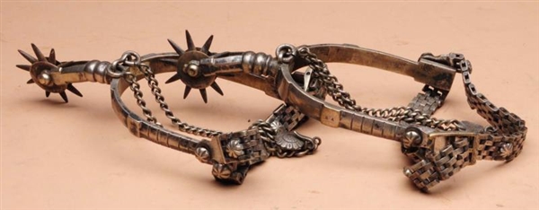 PAIR OF SPURS MARKED H.A.                         