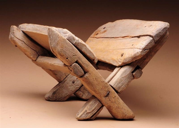 VERY PRIMATIVE WOODEN SEAT.                       