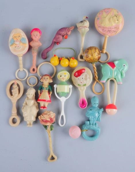 LOT OF CELLULOID BABY RATTLES.                    